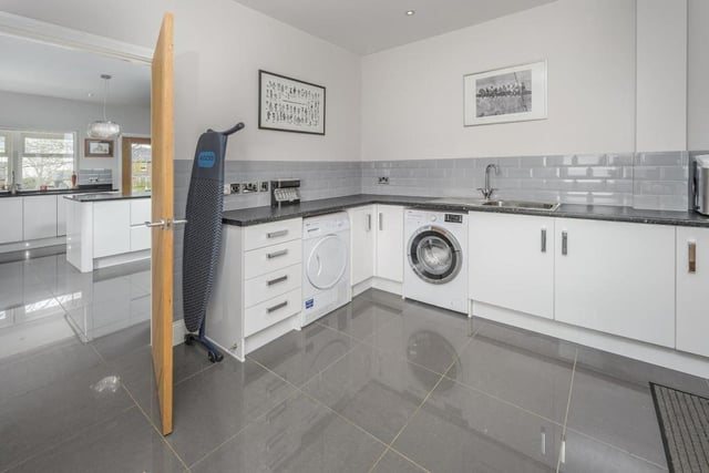 The utility room leading from the kitchen area is a magnificent size and could easily include a boot room.