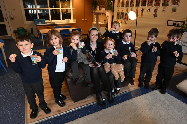 Assistant headteacher Catharine Harle enjoying a story with Central Primary School pupils.