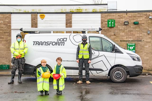 Reception pupils at NCEA Warkworth Primary School visit builders from Transform Building Services on the site of the new early years provision.