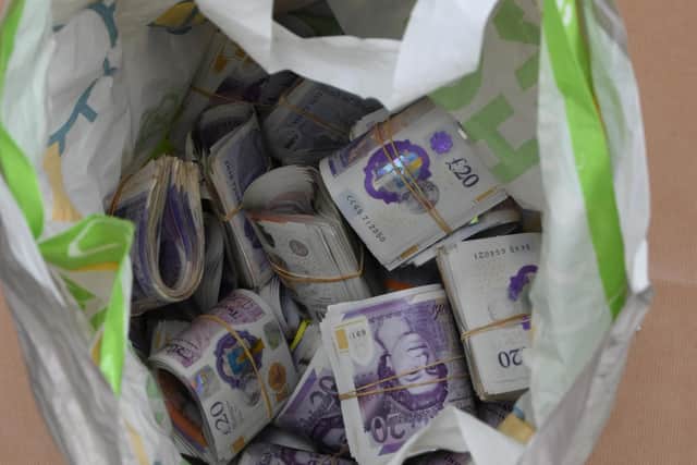 Bundles of £20 notes found at Walkerfield Court, the centre of the drugs operation.