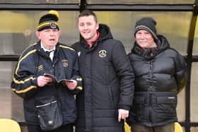 Avid Berwick Rangers supporter Tom Young, left, was at the home win against Gretna 2008 on Saturday. Picture: Ian Runciman