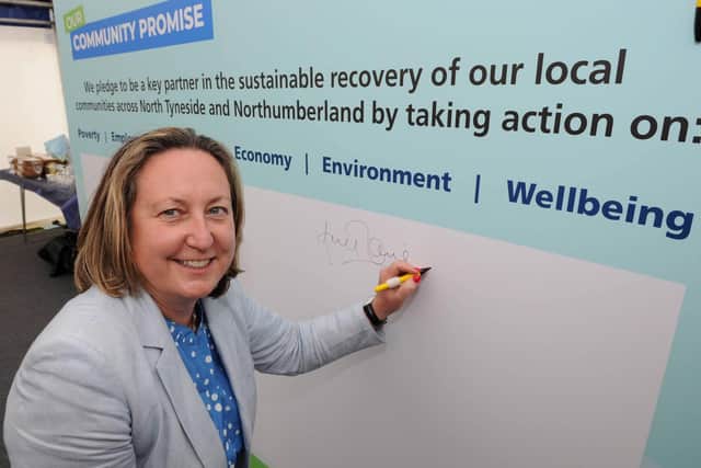 Anne-Marie Trevelyan MP signing a key partners board during the of Northumbria Healthcare's Our Community Promise at Berwick Infirmary. Picture by Raoul Dixon/North News