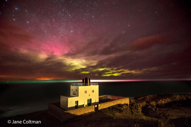 Jane Coltman's picture of the aurora at Bamburgh lighthouse.