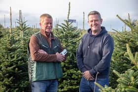 Kenneth Mitchell from Needlefresh with Dobbies’ plant buyer Nigel Lawton.