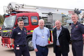 Joe Haustead, Cllr Gordon Stewart, Cllr Colin Horncastle and Graeme Binning with the new aerial ladder platform (ALP) at Northumberland Fire and Rescue Service.