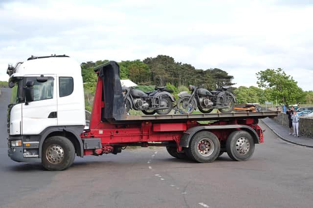 Motorbikes arrive at Bamburgh Castle ahead of filming.