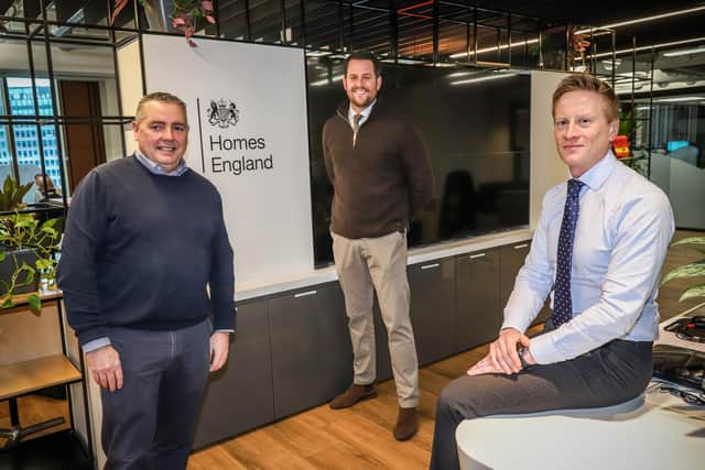 From left, Jon Irvine from Homes England, Dean Cook from Arlington, and Homes England senior manager David Robson. (Photo by Arlington Real Estate)