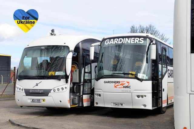 Two of the coaches which will be used to transport aid items and then relocate Ukrainian refugee families.