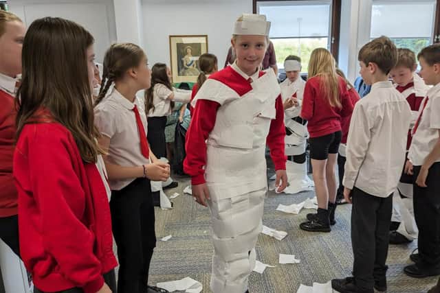 Pupils create wedding outfits while learning about the role of council registrars. (Photo by Northumberland County Council)
