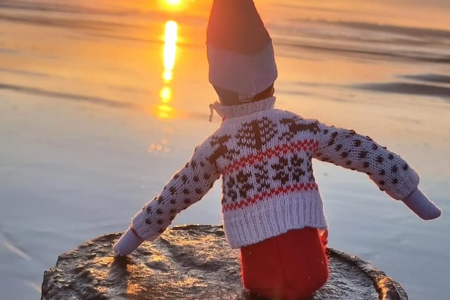 One of Santa's elves watches the sunrise at Blyth Beach before the busy season got underway ...