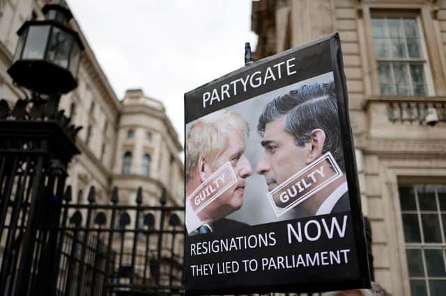 Protesters outside Downing Street this week, after Boris Johnson was fined for attending lockdown parties.