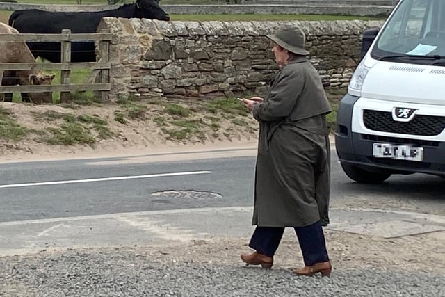 Brenda Blethyn, who plays DCI Vera Stanhope, crosses the road to film another scene during filming in Boulmer village, one of the locations for series 11 of the popular ITV crime drama Vera.