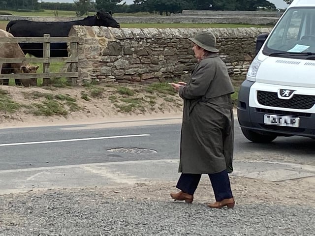 Brenda Blethyn, who plays DCI Vera Stanhope, crosses the road to film another scene during filming in Boulmer village, one of the locations for series 11 of the popular ITV crime drama Vera.