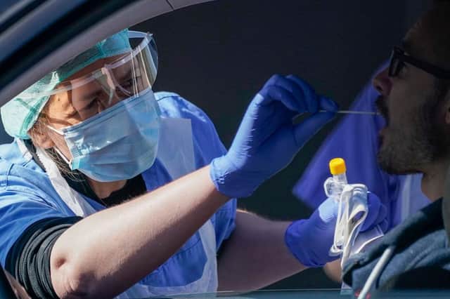 National Health Service (NHS) workers are tested for Coronavirus (Covid-19) at a drive-through testing site (Photo by Christopher Furlong/Getty Images)