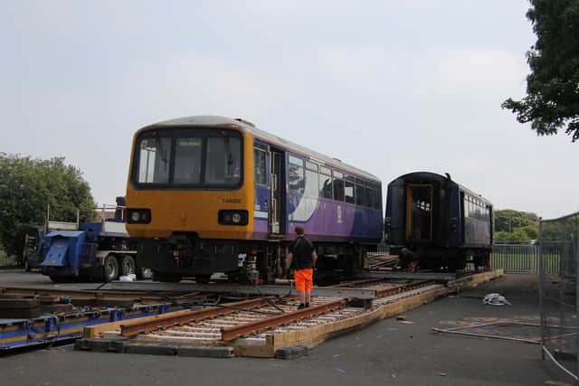 The train being assembled in the school grounds.