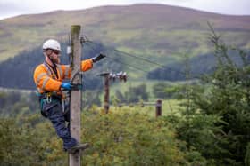 An Openreach engineer in remote countryside.