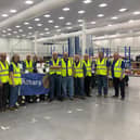 Rotary Club of Blyth members in the warehouse after packing the boxes for the project.