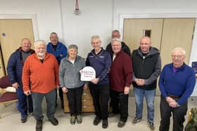 Coquet Canoe Club members at the presentation. From left, Davey Jackson, John Marshall, Hamish Gibson, Linda Pooley, Phil Scowcroft of British Canoeing, Eric Petrie , Jimmy Powers, John Robertson and Dave Burke. Picture: Coquet Canoe Club