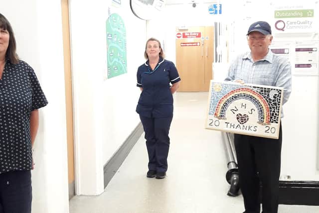 Mark Stevenson, right, with Alnwick Infirmary clerk Jacqueline Waite, left, and outpatient department manager Dawn Matthews, centre.