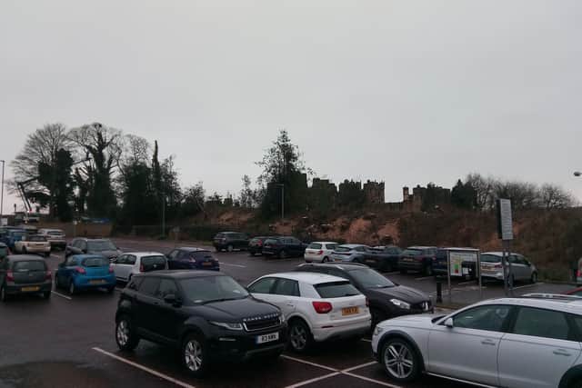 The Greenwell Road car park with Alnwick Castle beyond.