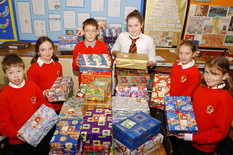 Pupils from the Duke's Middle School in Alnwick begin their Christmas preparations by sending Christmas boxes to the national Operation Christmas Child Appeal, in December 2003.