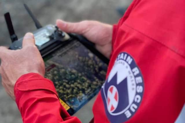 Northumberland National Park Mountain Rescue Team using a drone to check the extent of the blaze.