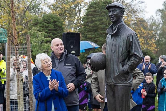 Jack's widow Pat admires his statue in Hirst Park. Picture: Keith Saint