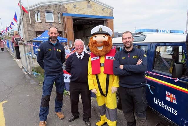 Station coxswain/mechanic Craig Pringle, harbourmaster Brian Wilson, Stormy Stan (Volunteer cox'n Keith Slater) and station mechanic Graeme Trotter.