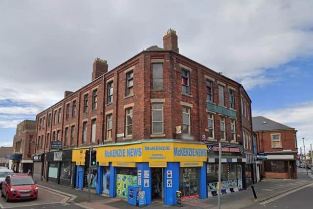 Upper floors of the building on the corner of Union Street and Bridge Street have been vacant since 2017. (Photo by Google)