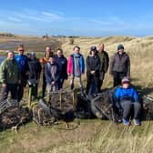 Litter-picking volunteers on Holy Island at the last clean-up event.