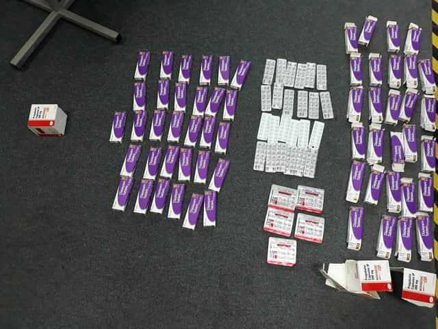 Some of the prescription drugs recovered by police.