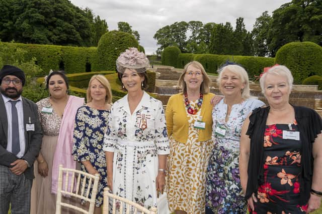 The Duchess of Northumberland with some of the carers and volunteers at the event. Picture: Jane Coltman