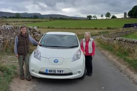 Clive and Joan Wilkinson with their electric car.