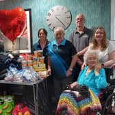 Staff and residents at Station Court with the items collected for Streetworx. (Photo by Barchester Healthcare)