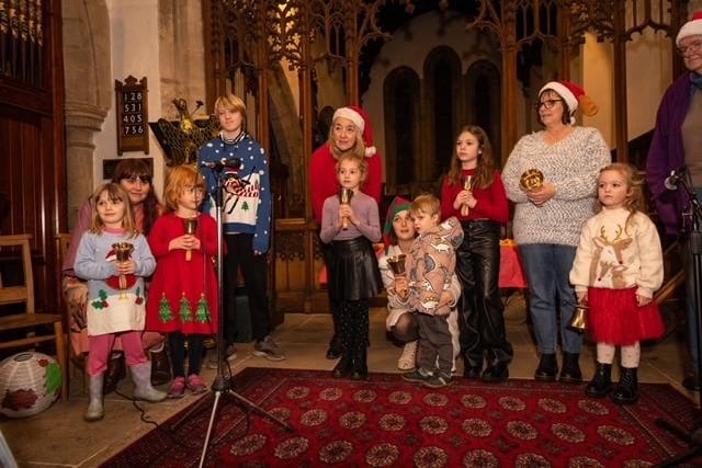 Several children from Rothbury First School sang and played the handbells in All Saints Church following the switch-on.