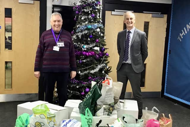 Paul Newman (school governor and food bank volunteer) and Neil Rodgers (executive headteacher).