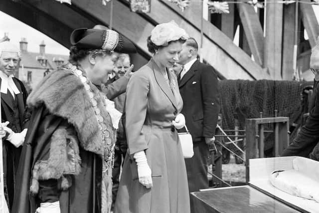 The Queen is presented with a salmon on her visit to Berwick in 1956 in the same area that is set to be one of the county council's QEII Commemoration Schemes. She is pictured with Mayor Mrs Adams by the Royal Tweed Bridge.