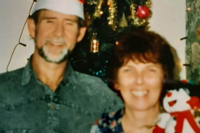 A happy family album snap of David and Janice Hunter at Christmas.