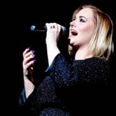 Katie Markham performing Adele's songs on tour.