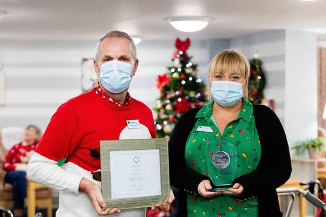 Richard Dobinson and Riverside House manager Julie Roper with last year's Caring UK Award.