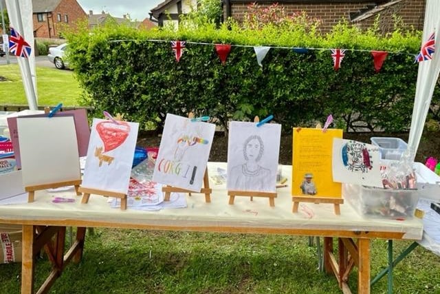 Some Queen-inspired artwork created by local children.