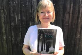 Katherine James with a copy of her new book, The Story of Hope.