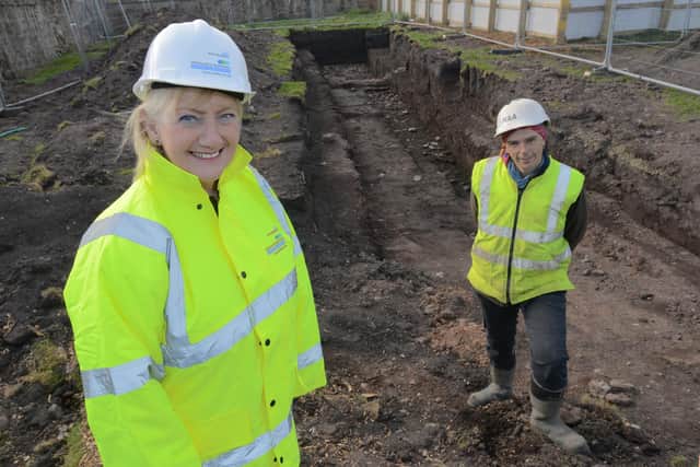 Marion Dickson, Northumbria NHS  executive director of Nursing, Midwifery, Surgery and Community Services, is taken through how the dig is progressing by project officer Steve Collison of Northern Archaeological Associates.