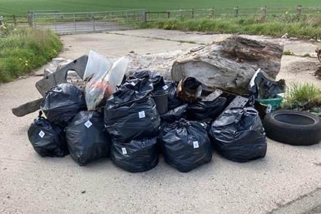 Rubbish collected at the Street Blitz covering the lane that runs to Hebron from the Morpeth-Longhirst B1337 road.