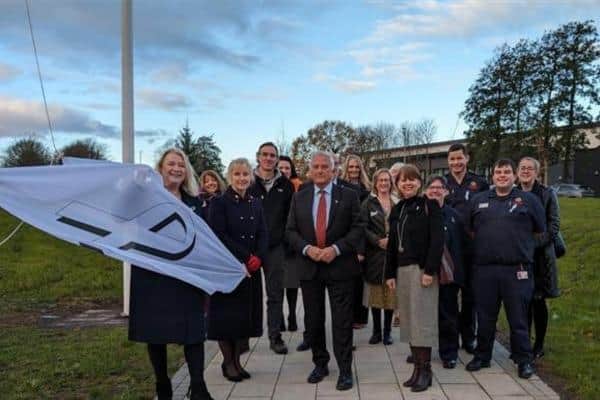 Northumberland County Council and Northumberland Fire and Rescue Service raise the White Ribbon flag at the start of the campaign. (Photo by Northumberland County Council)