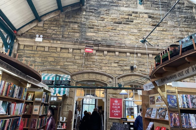 Another captivating feature of Barter Books is the train that runs across the top of the book shelves.