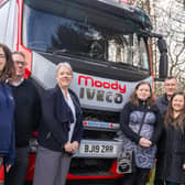 From left, Mike Denbury, Catherine Kirkham, Richard Moody, and managing director Caroline Moody with Peter’s daughter Jessica Marszalkowski, family friend Brian Jones, and niece Emily Leightley alongside the truck named Geordie Squirrel in Peter’s memory. (Photo by Moody Logistics)