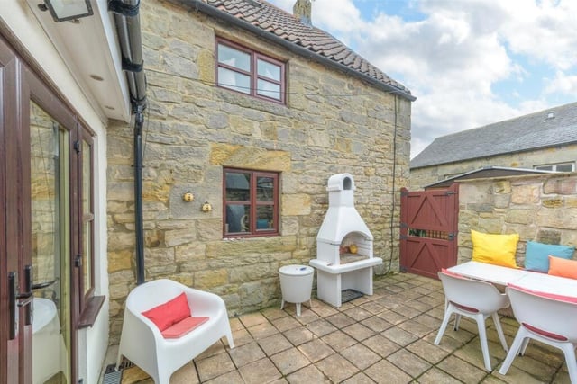 Characterful North Northumberland barn home for sale in rural hamlet