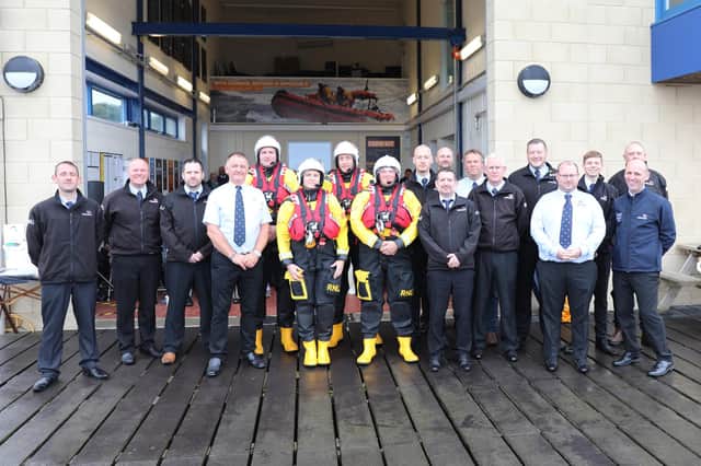 Volunteer crew and Station Management outside of the boat hall at Blyth RNLI.