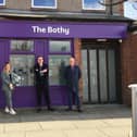 Everyturn chief executive Adam Crampsie (centre), pictured outside The Bothy in Ashington, has criticised the government. (Photo by Everyturn)